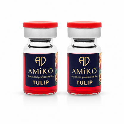 Two Amiko Tulip skincare bottles with red caps on a white background